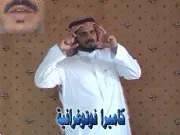 توضيح إشارة "كاميرا فوتوغرافية" - Sign demonstration for "photo camera"