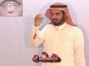 توضيح إشارة "هذه" - Sign demonstration for "This (Feminine)"